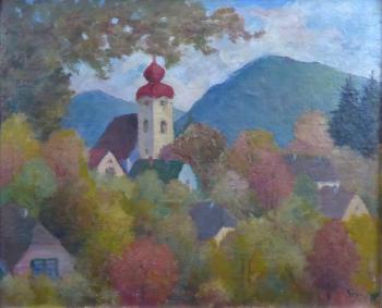 Autumn in small town with a church tower and hills Autumn in small town with a church tower and hills